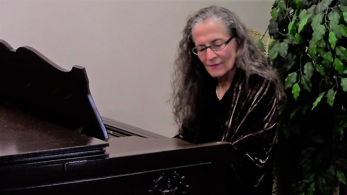 Laura Massaro playing piano